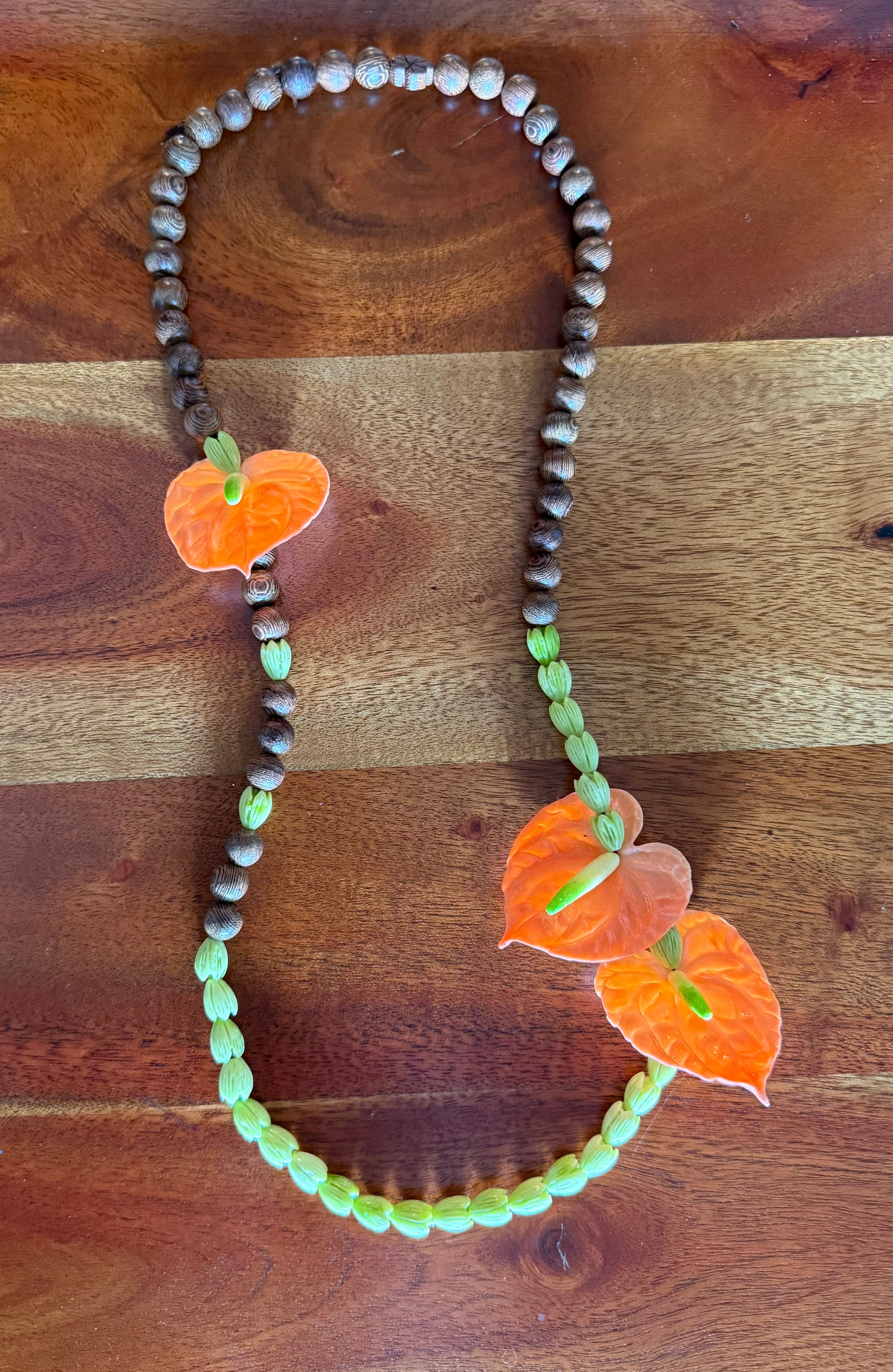 Orange/Green Anthurium w/ Pikake & Dark Wood